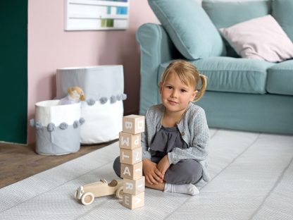 Toddlekind opbergmand stone sfeerfoto woonkamer ingezoomd